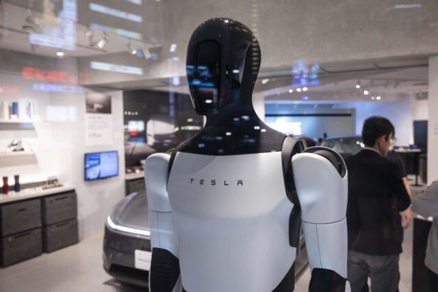 JAPAN - 2025/04/25: Tesla Optimus humanoid robot on display inside the Tesla pop-up store near Shibuya crossing. In April 2025, Tesla opened a pop-up store in Shibuya, Tokyo,