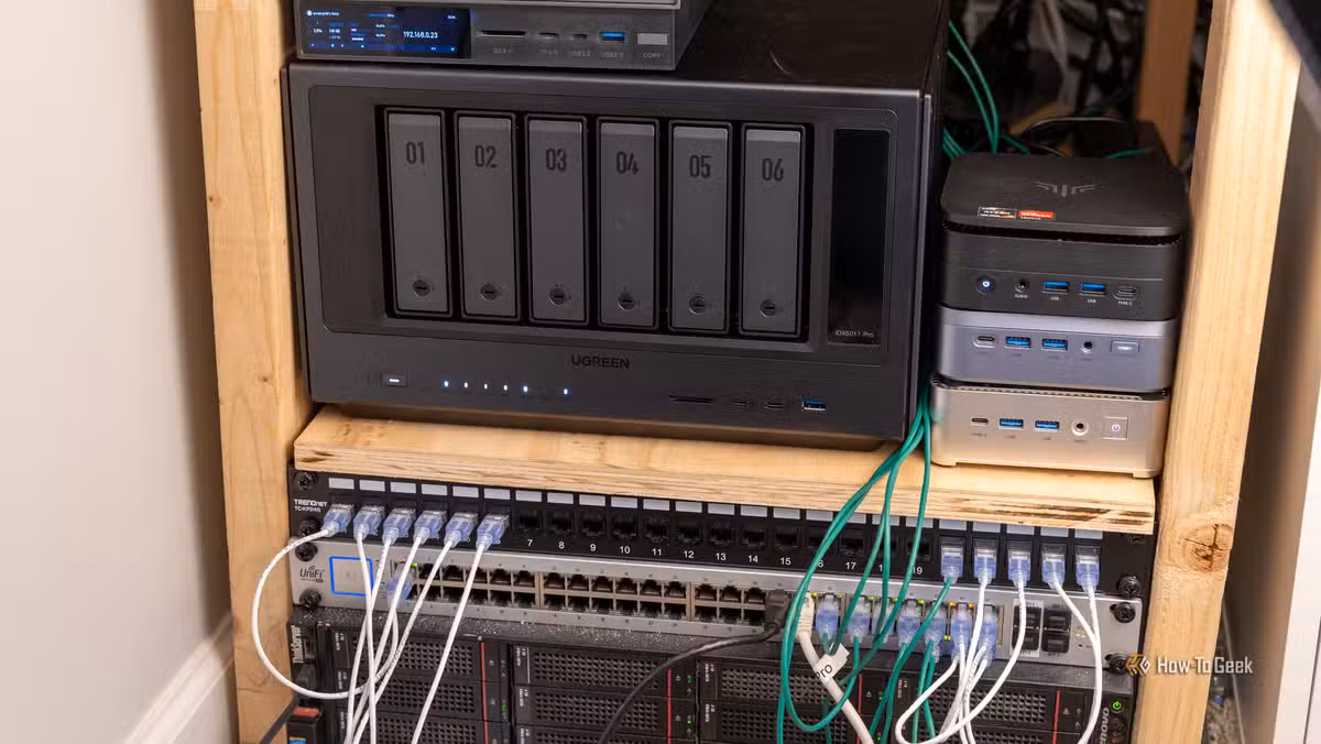 A typical homelab shelf with NAS, mini PCs, and network gear separated by function