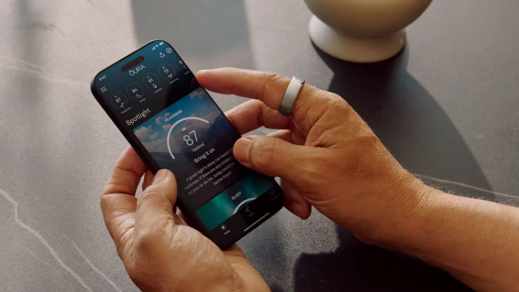 The Oura Ring 4 features a recessed 'Smart Sensing' design for improved skin contact and accuracy