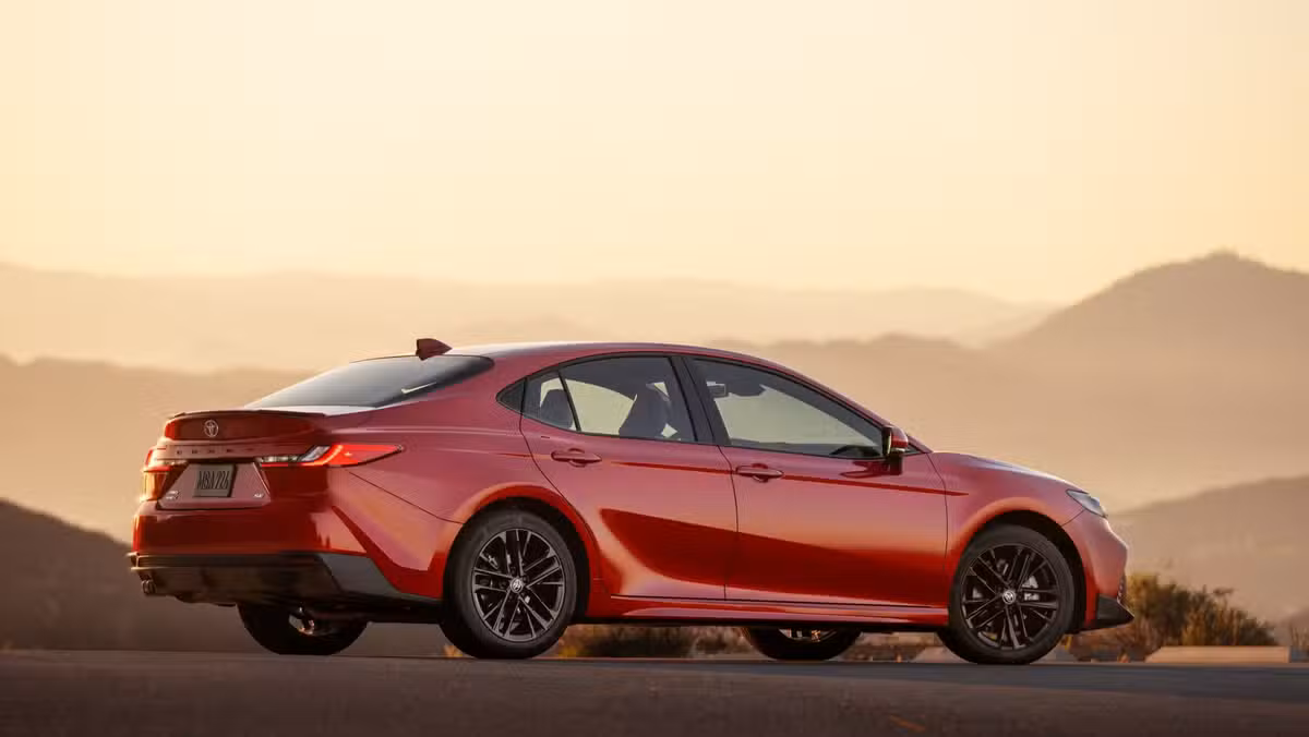 The 2026 Toyota Camry SE AWD in Supersonic Red