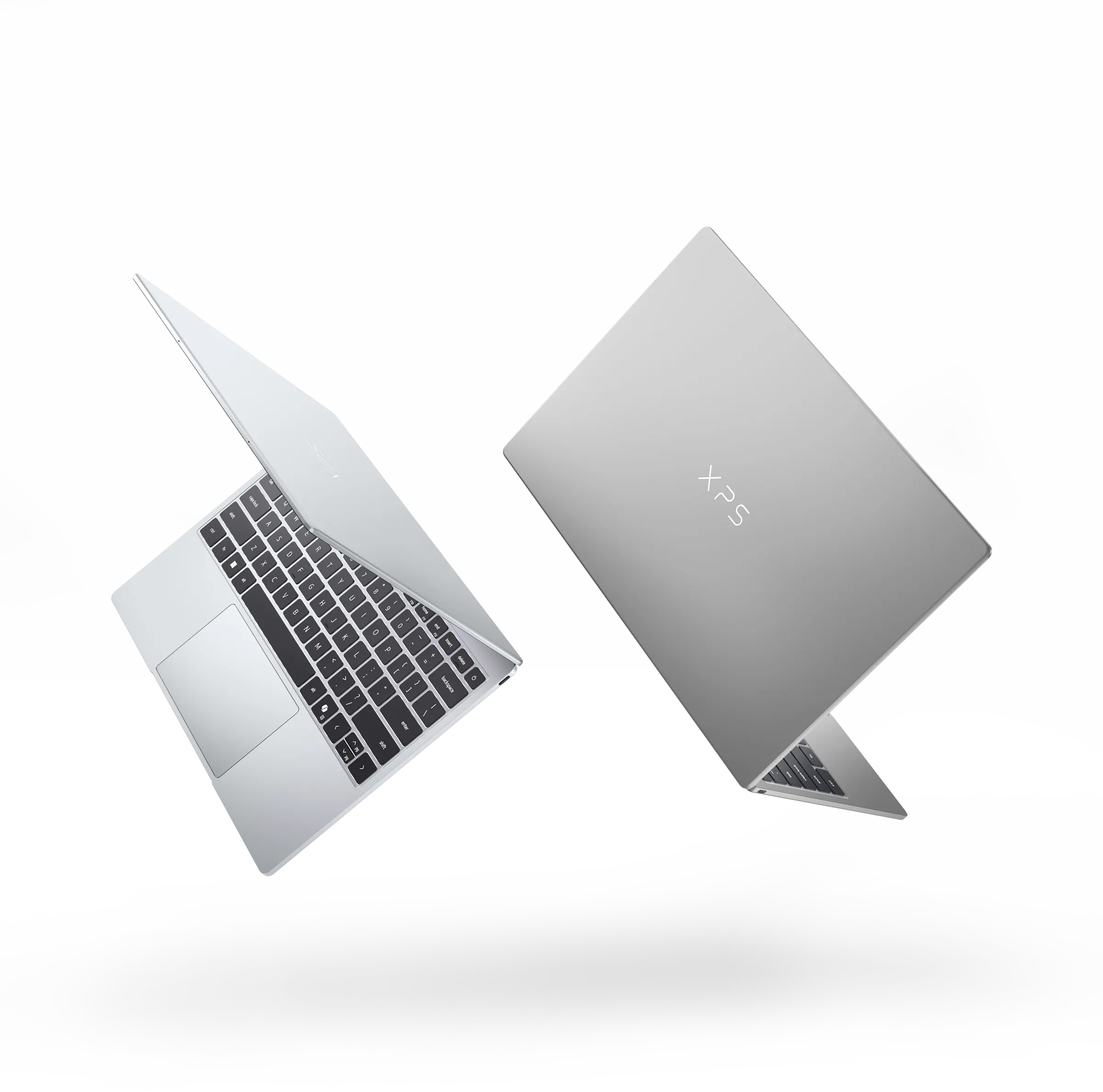 <em>The new XPS 13 in its silver and gray colors, which Dell calls “sky” and “storm.”</em>