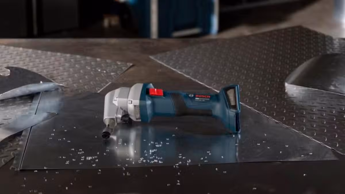 The Bosch 18V Nibbler cuts sheet metal by taking small bites rather than grinding or shearing
